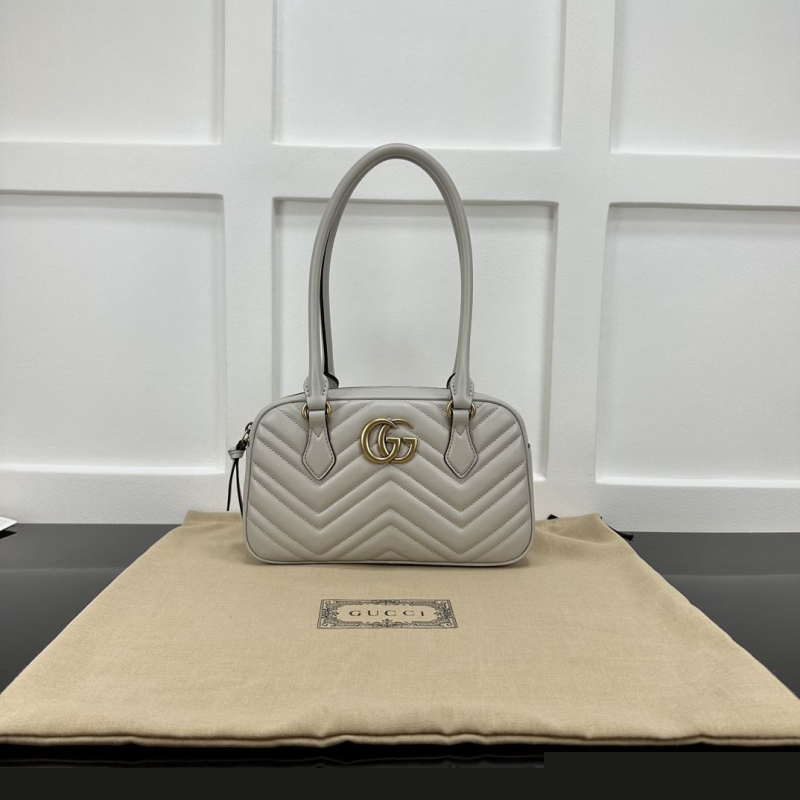 G*u*i top handle bags